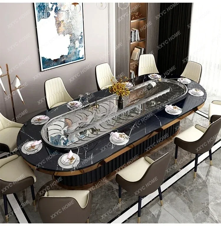 A Electric rotating dining table and chairs oval rectangular rock slab dining table with hot pot turntable restaurant