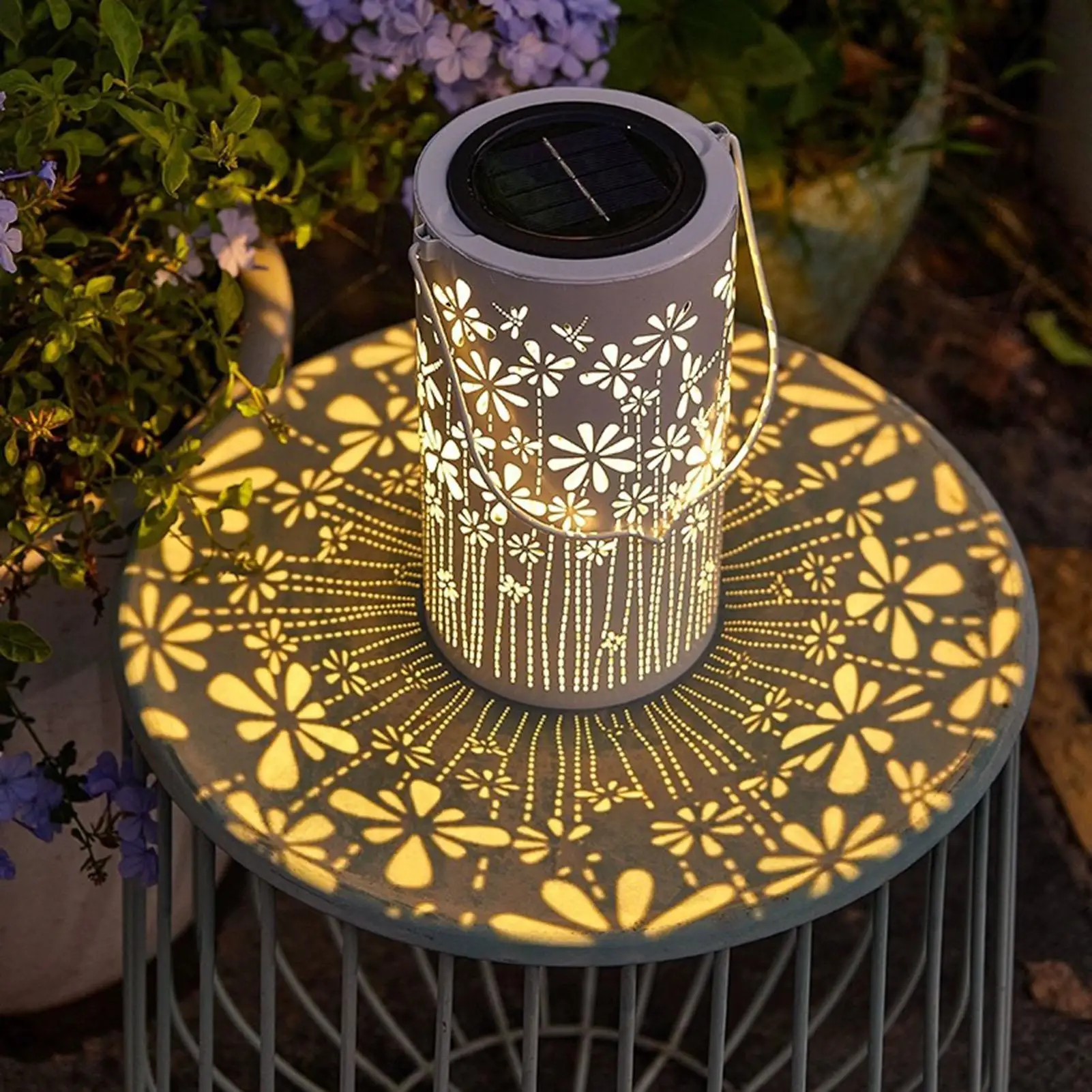 Pathway illuminated by multiple solar flower lanterns