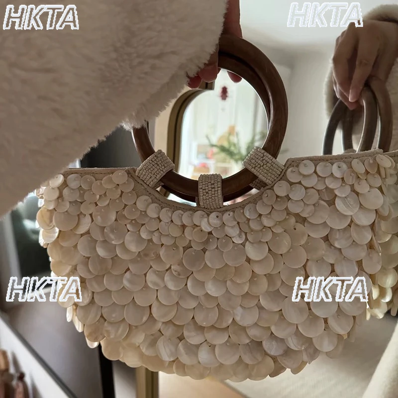 Elegante 2025 verão novo artesanal natural bege concha saco para senhoras moda nicho personalidade na moda bolsas femininas