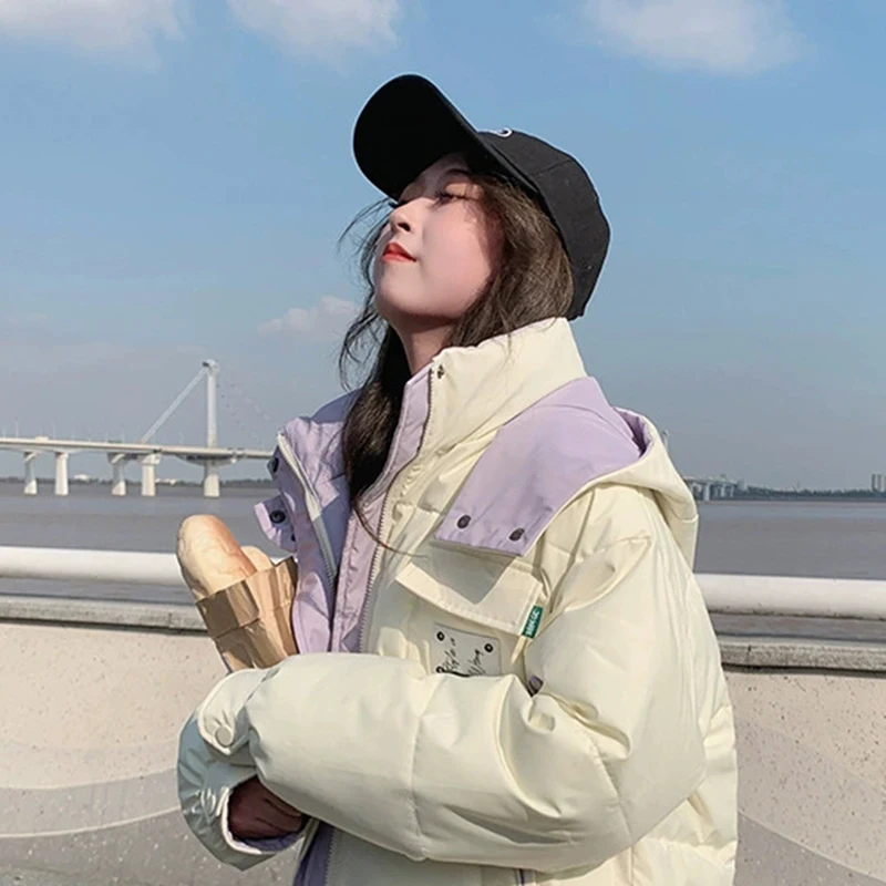 Piumino corto oversize da donna 2025 Nuovo inverno spesso caldo bianco con cappuccio piumino in cotone elegante parka allentato capispalla casual