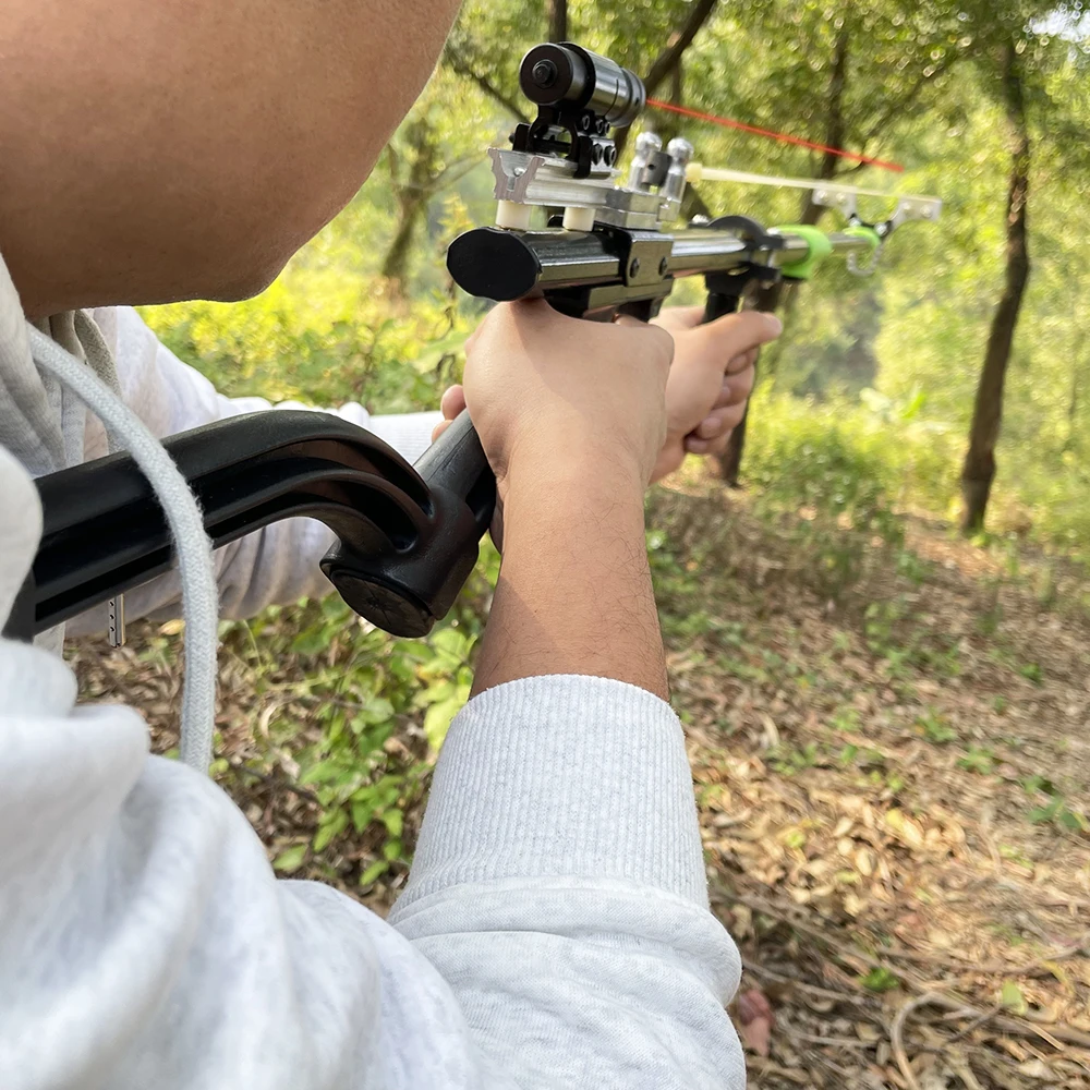 

Лазерная рогатка с высокой точностью прицеливания, мощная катапульта для охоты на открытом воздухе, рогатка с автоматическим спусковым механизмом.