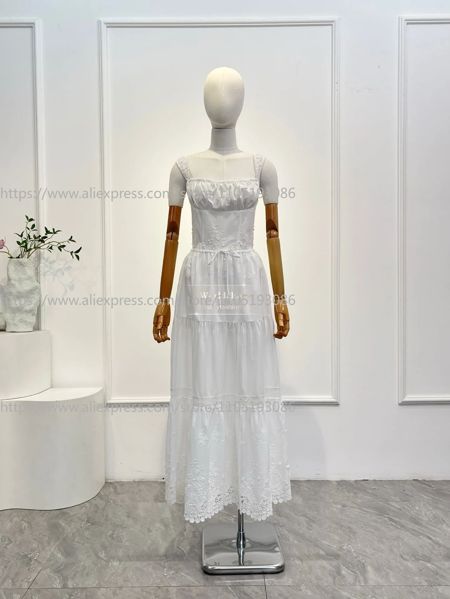 

Новый комплект 2026: Белая блузка-жилет без рукавов с вышивкой и кружевом и юбка миди — комплект из двух предметов для женщин