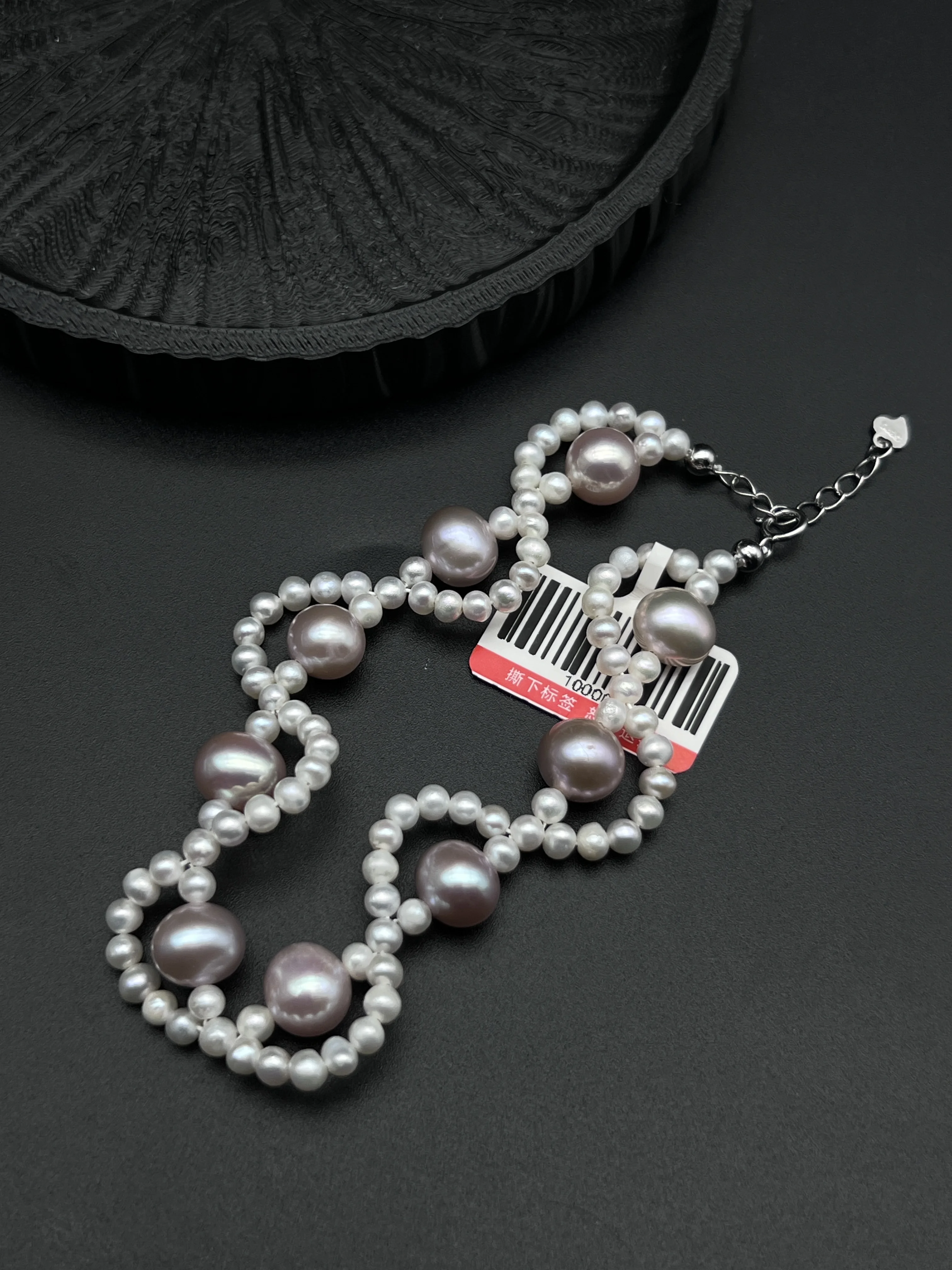 

Woven Two-Tone Pearl Bracelet with Alternating Large & Small Lavender Beads