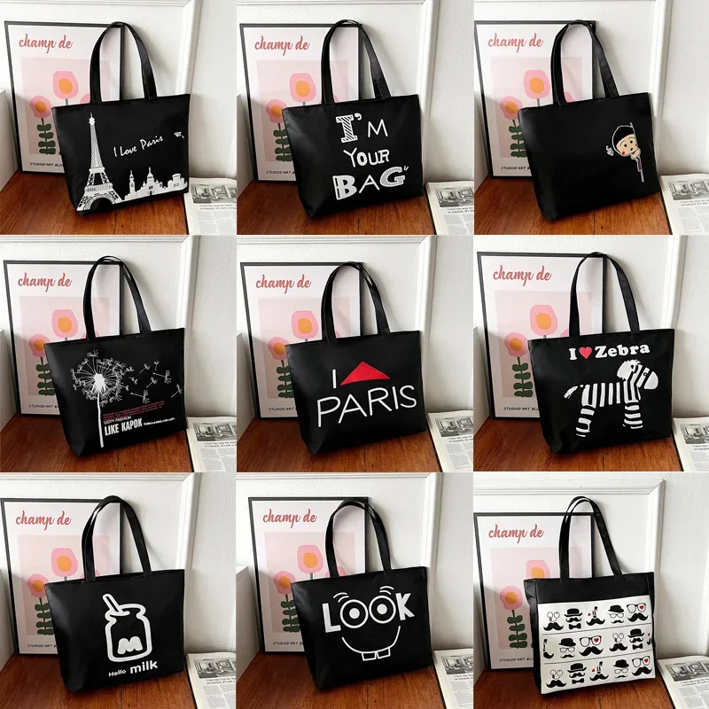 

2023The New Canvas Bag Large Capacity Black Flowers Eiffel Tower Tote Bags Single Shoulder Bag Messenger Bag Bag for Women