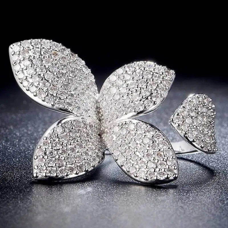 Huitan Edler Damenring in Blumenform mit voller, glänzender CZ-Besetzung, wunderschönes Party- und Hochzeits-Accessoire, modischer Damenschmuck