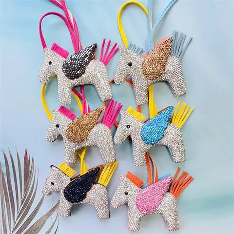 

Cartoon Angel Pegasus Charm: Trendy PU Leather Diamond-Embedded Style, Keychain & Bag Pendant, Pony Design