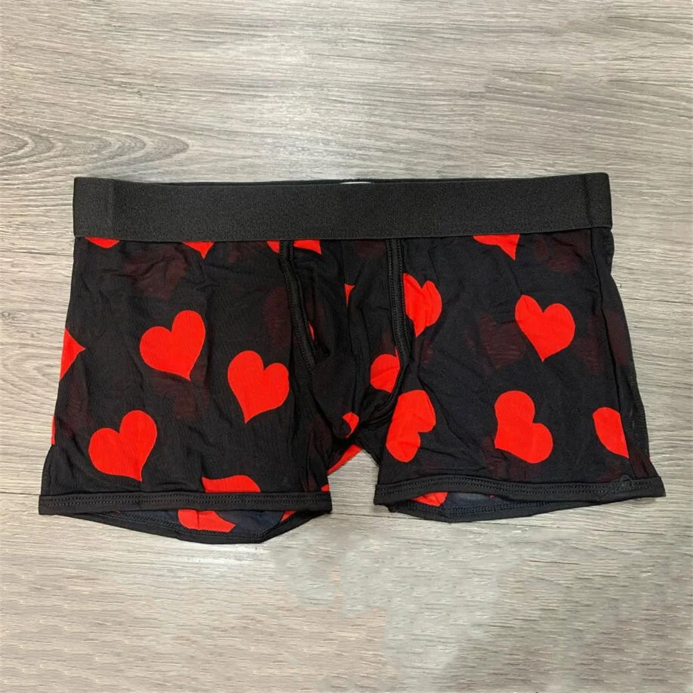 Bóxer de malla transparente para hombre, ropa interior Sexy con estampado de corazones, transpirable, talla grande