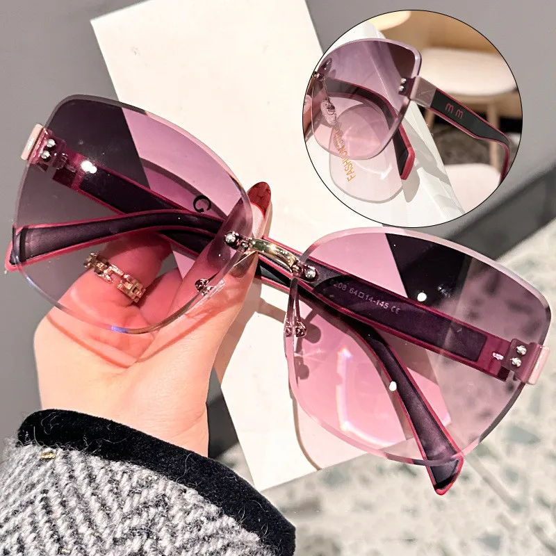 2025 new large frame cat eye fashion sunglasses for women without frame cutting edge protection ultraviolet sunglasses(DS-8208)