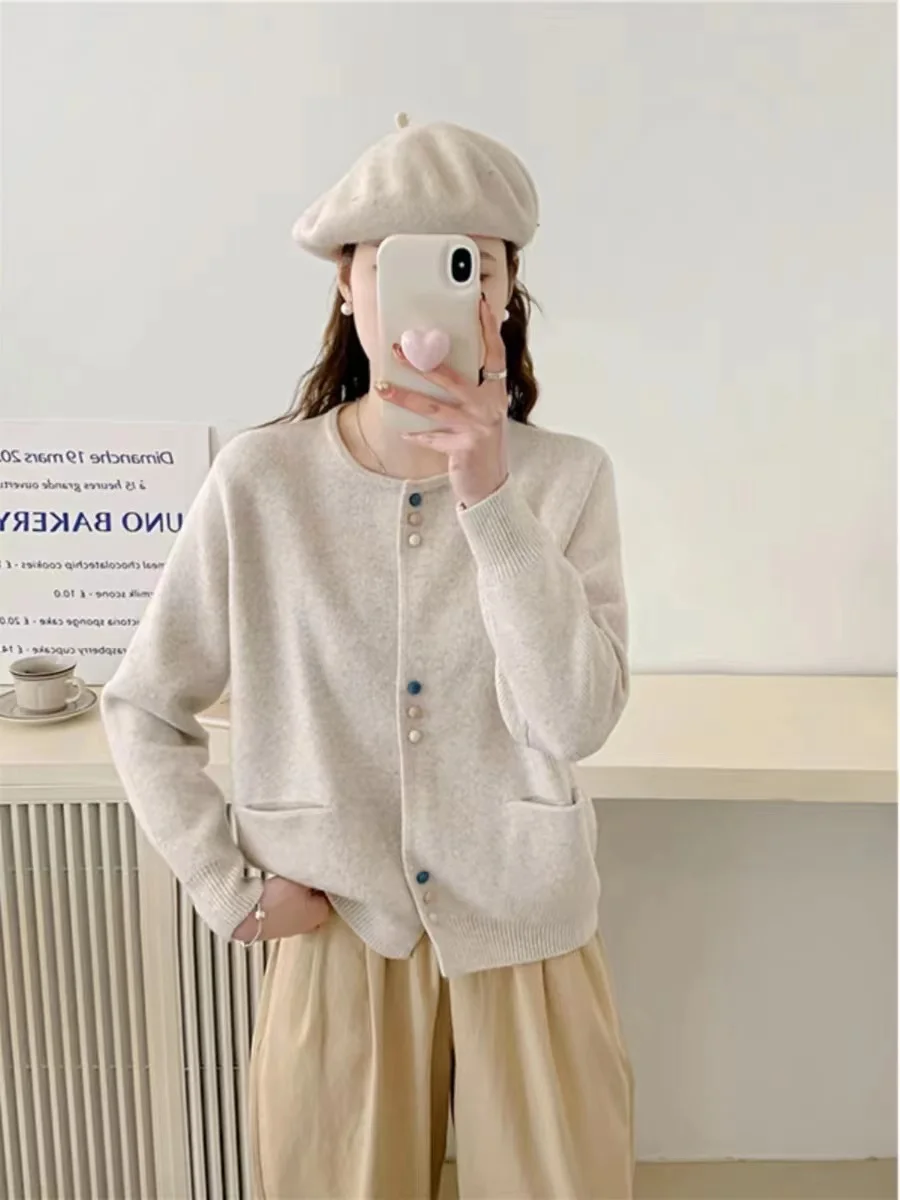 

Hot selling short fashion women's O-neck cardigan 100% wool sweater solid color knitted long sleeved jacket women's sweater