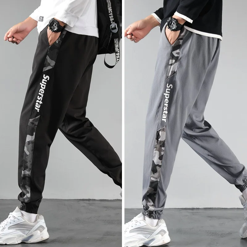 

UETEEY Men's Drawstring Sweatpants Letter Print Camouflage Leggings Pants Men Breathable Casual Joggers Running Sports Pants Man