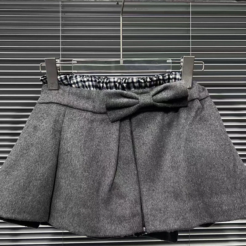 KBQ أنيقة أنيقة تقسم Bowknots ألف خط التنانير للنساء عالية الخصر مزاجه طيات التنانير الصغيرة الإناث موضة الخريف نمط