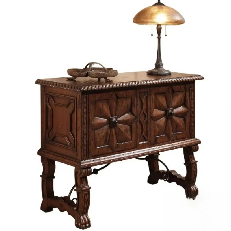Antique wooden locker with carved star door and claw feet, suitable for living room