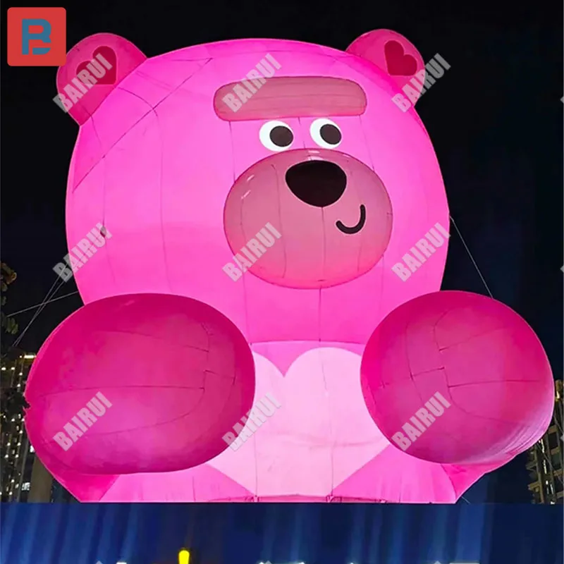 Modelo inflável de urso rosa fofo escalar na parede fora da fachada da parede do shopping mercado panorâmico adereços de iluminação romântica