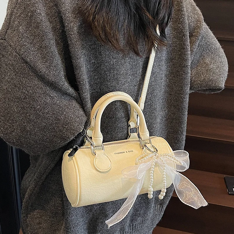 Travesseiro de luxo bolsa portátil feminina design vintage exclusivo casual ombro crossbody boston bolsa fim de semana escapamento alta qualidade ​