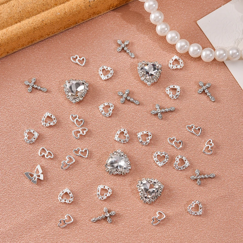60PCS Silver Nail Charms Crystal Heart Nail Charms 3D Alloy Cross Nail Charms Metal Butterfly Charms Nail Gems Rhinestones view 5