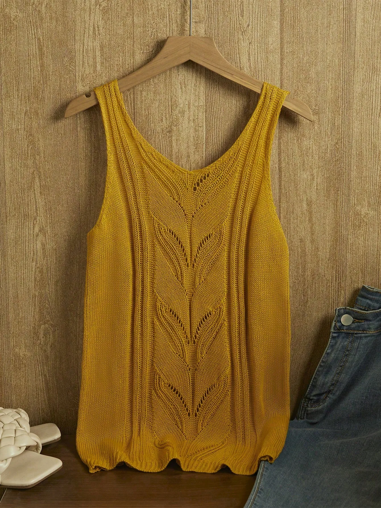 

French ice silk summer Korean version loose hollow open slit knitted cardigan medium-length vest female design sense niche top