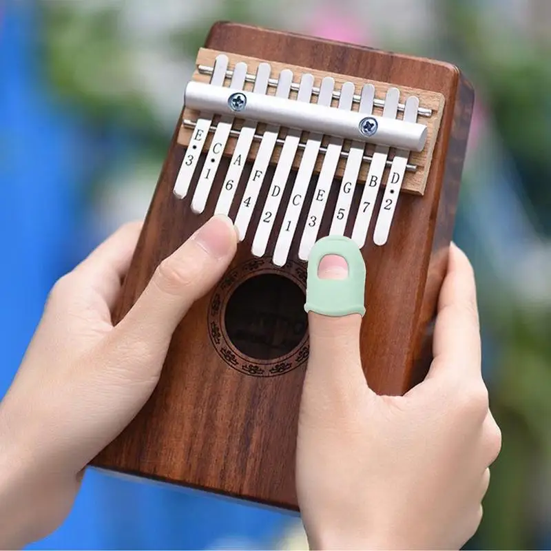 Kalimba Finger ครอบคลุมซิลิโคนกีตาร์ Finger Protector Breathable Kalimba Finger สําหรับ Mandolin Ukulele เย็บเย็บปักถักร้อย