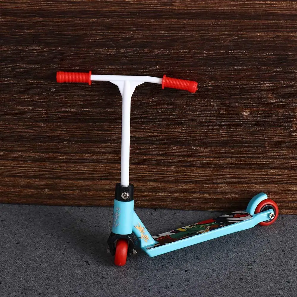 Giocattoli per dita per bambini per allenamento con le dita Scooter educativo rimovibile per dita Mini scooter Mini scooter per dita Skateboard per dita