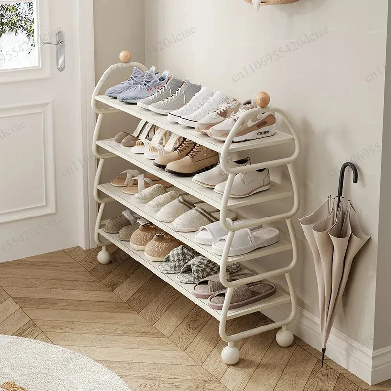 Multi story simple narrow small shoe rack with cream wind at the doorstep