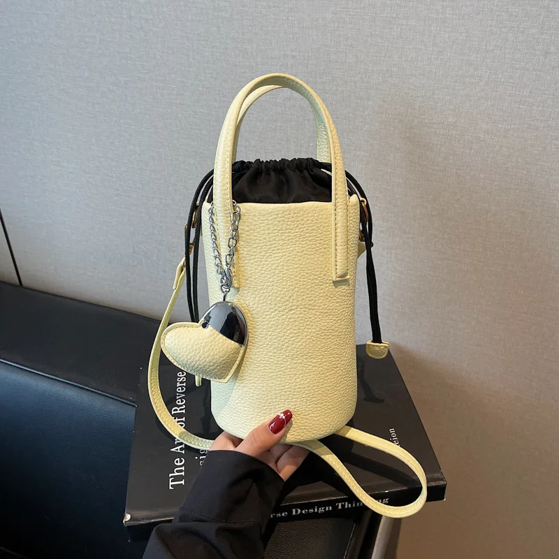 

2025 Simple Style Drawstring Bag - Retro solid color Wandering Shoulder Bag, versatile crossbody & clutch bag, for ladies