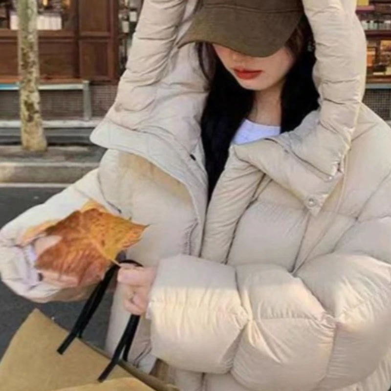 

2025 зимняя новая однотонная горячая распродажа, утолщенная теплая короткая утолщенная хлопковая куртка с капюшоном для женщин