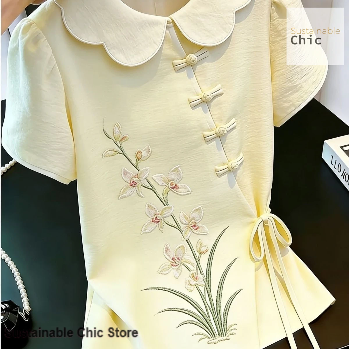 

New Chinese light yellow short-sleeved national style shirt for women's summer temperament, gentle and excellent design sense.