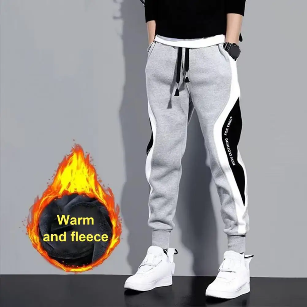 

Winter new matching color plus fleece warm small foot pants men's sports pants fitness casual pants men M-3XL