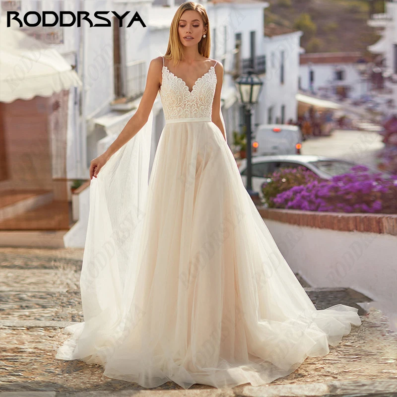 RODDRSYA Encantador Spaghetti Straps Vestido De Noiva Para A Noiva Sexy V-Neck Backless Vestido Novia Civil A-Line Tulle Vestidos De Noiva Encantador Spaghetti Straps Vestido De Noiva Para A Noiva Sexy V-Neck Backless