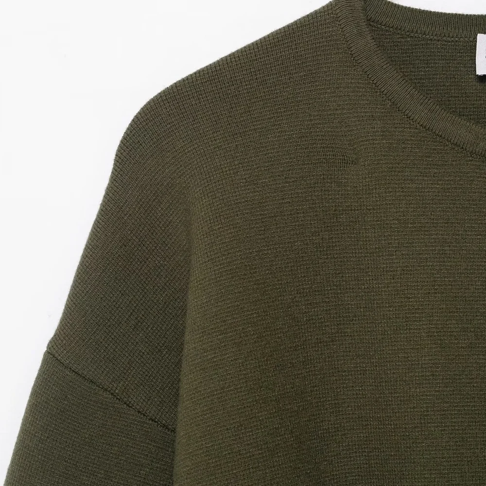 UNIZERA 2025 nuevo producto moda Casual para mujer diseño de estilo europeo y americano con cinturón abrigo corto de punto