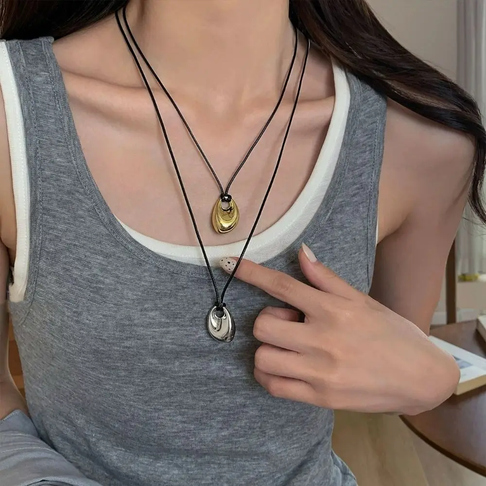 Collar de cuerda negra de aleación de moda, colgante de frijol, cadena larga ajustable para suéter, joyería de moda dorada/plateada, cadenas para clavícula