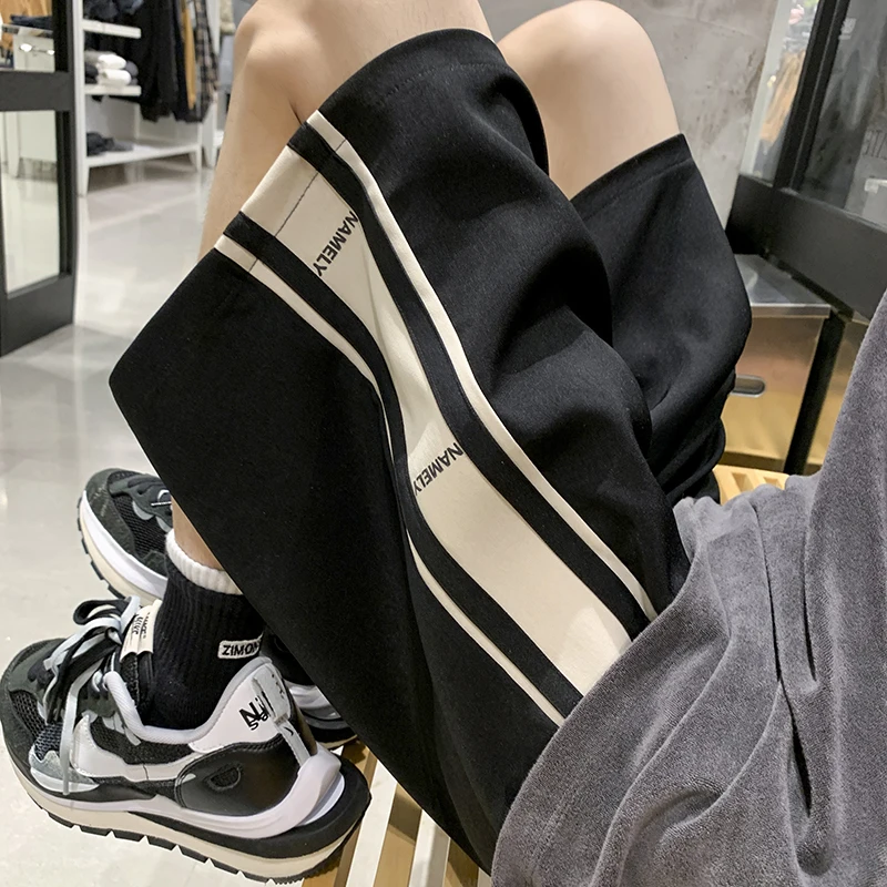 

Trendy Men's Casual Pants Five-Quarter Length Loose Fit Summer Thin Sle Faionable Printed Splice Polyester Fiber Straight...