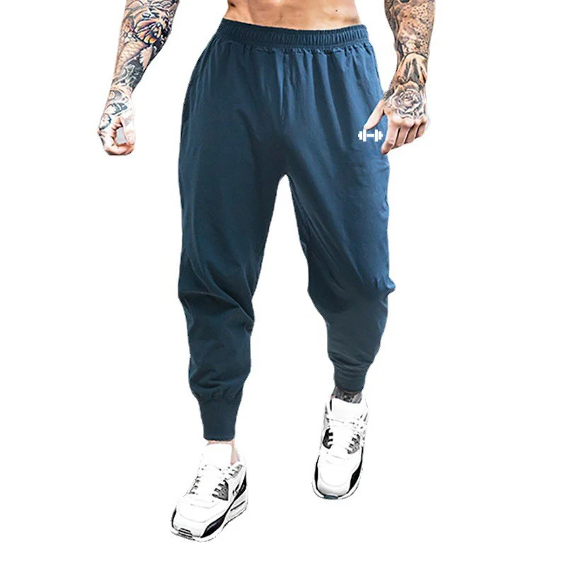 Palestra Bodybuilding Fitness pantaloni sportivi da uomo pantaloni da allenamento Casual vita elastica pantaloni lunghi larghi a vita alta ultrasottili ad asciugatura rapida