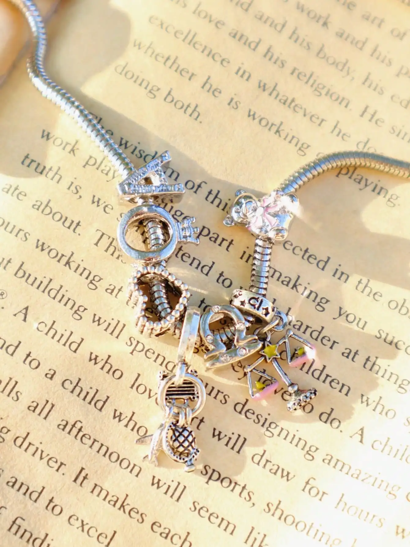 

Silver-Tone Charm Necklace with Heart, Scales & Animal Pendant