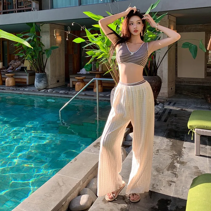 

Новое бикини из трех частей в отпускном стиле, женский сексуальный купальник в клетку с разрезом и свободными длинными брюками, классический купальный костюм с горячими источниками