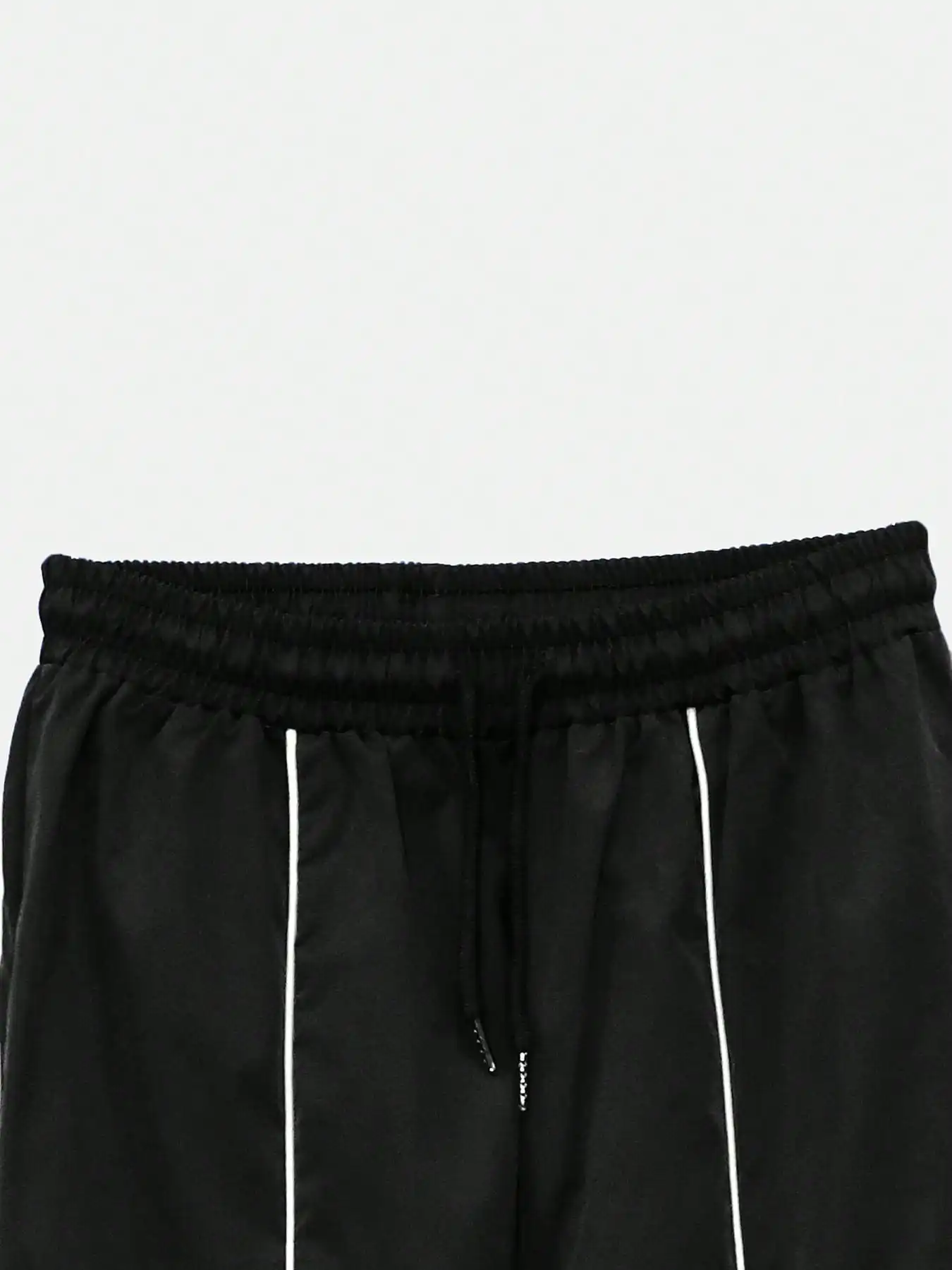 2-delige damesset met zwarte contrasterende strepen en trainingsbroek met wijde pijpen en elastische taille