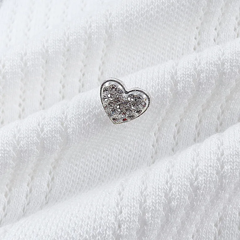 เสื้อโปโลสไตล์ฝรั่งเศสสีสันสดใส ฤดูใบไม้ผลิ/ฤดูใบไม้ร่วง ปี 2026 เสื้อผู้หญิงสีขาวแบบสวมพร้อมกระโปรงถัก