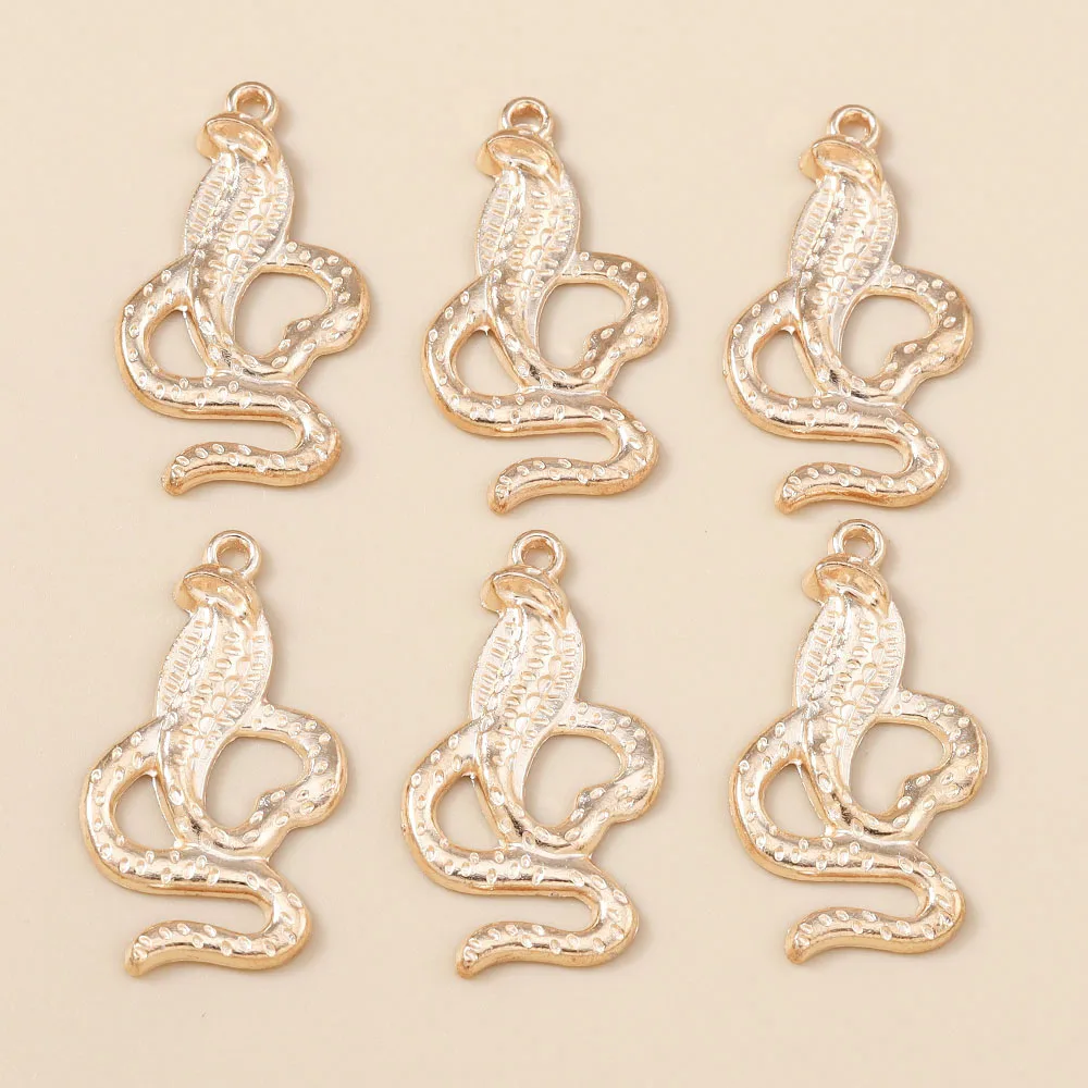 Leslie 10 Stück 18 x 34 mm goldfarbene Cobra-Schlangen-Anhänger für DIY handgefertigte Halsketten, Armbänder, Schmuckherstellung – Detail 5