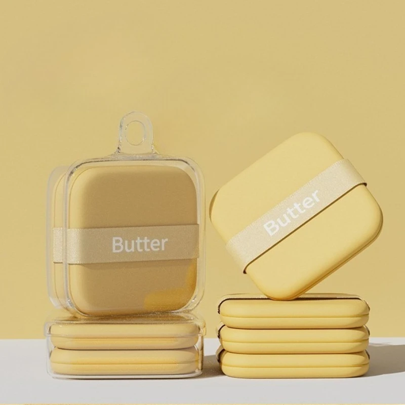 تتصبح البسكويت ذات وسادة هوائية على شكل زبدة كبيرة في الاتصال مع أدوات مكياج فائقة النعومة على الوجهين منتفخة زبدة الطاعة