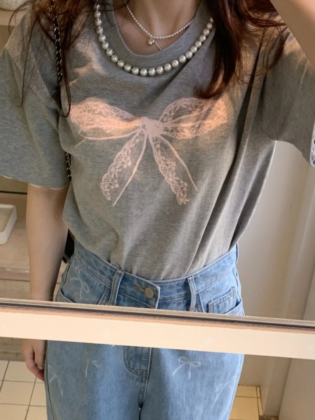 T-shirt da donna estiva nuova con stampa nodo in pizzo ort Sve Pearl round Ne Loose Top coreano Sle Pendolarismo Faion