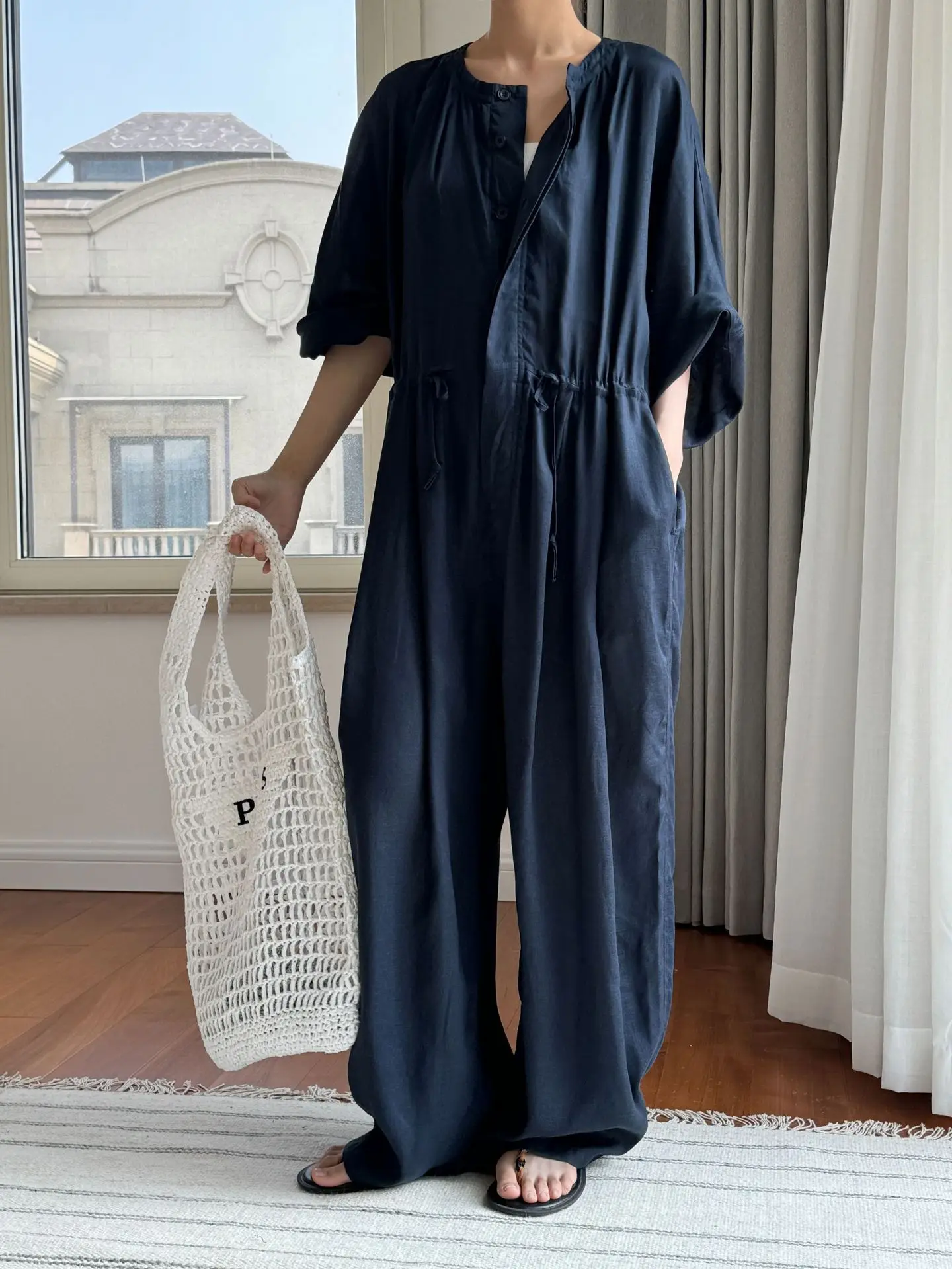 Spring and summer women\'s casual solid color round neck long sleeved loose jumpsuit