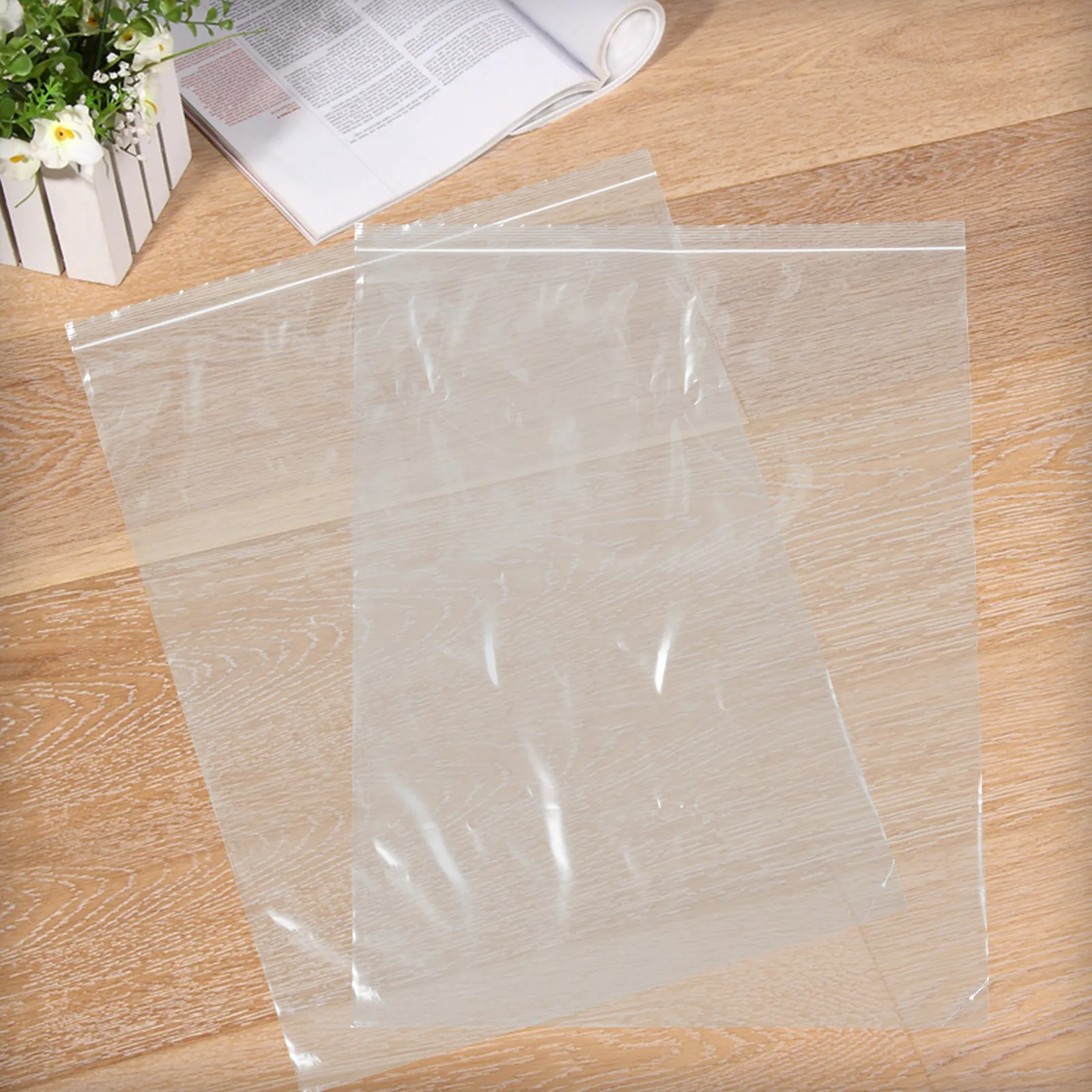 

HEALSOPTHY 12Pcs Extra Large Resealable Storage Bags 23.6x17.7 Inch Transparent Organizer for Clothes Travel Home