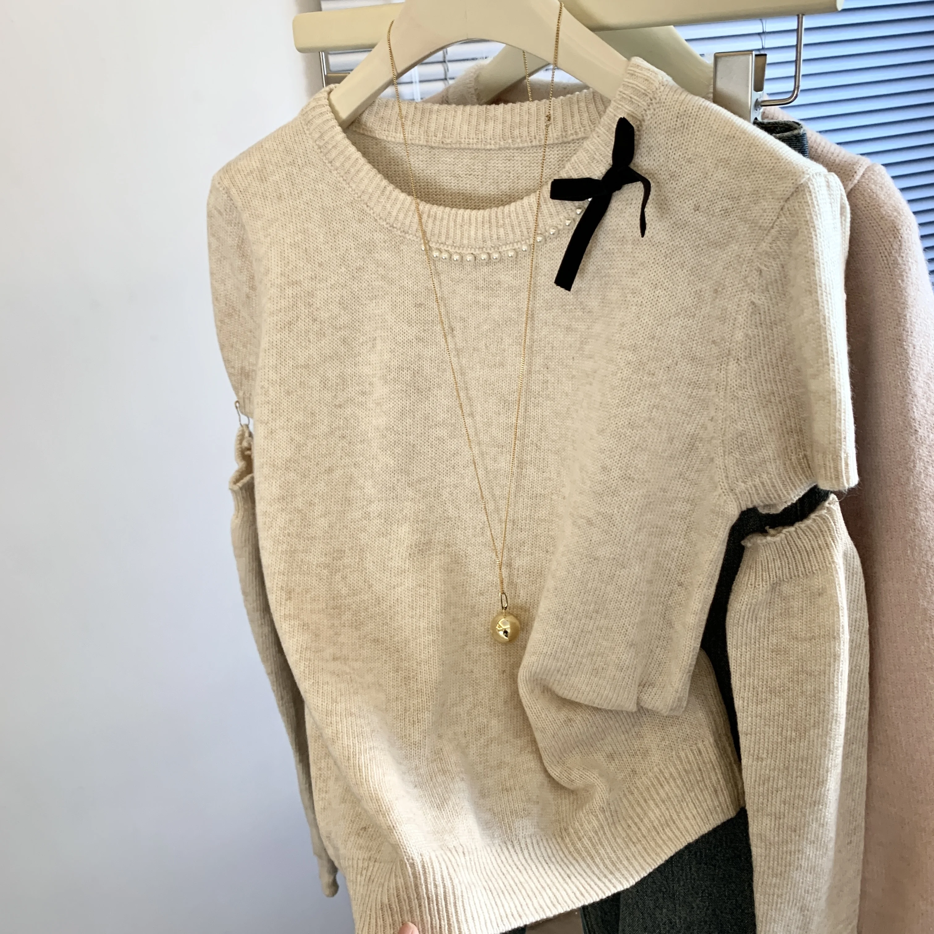 Maglione da donna con fiocco color albicocca, perline per unghie, industria pesante, moda chic, coreano Y2k, girocollo, autunno e inverno, lavorato a maglia anni '90