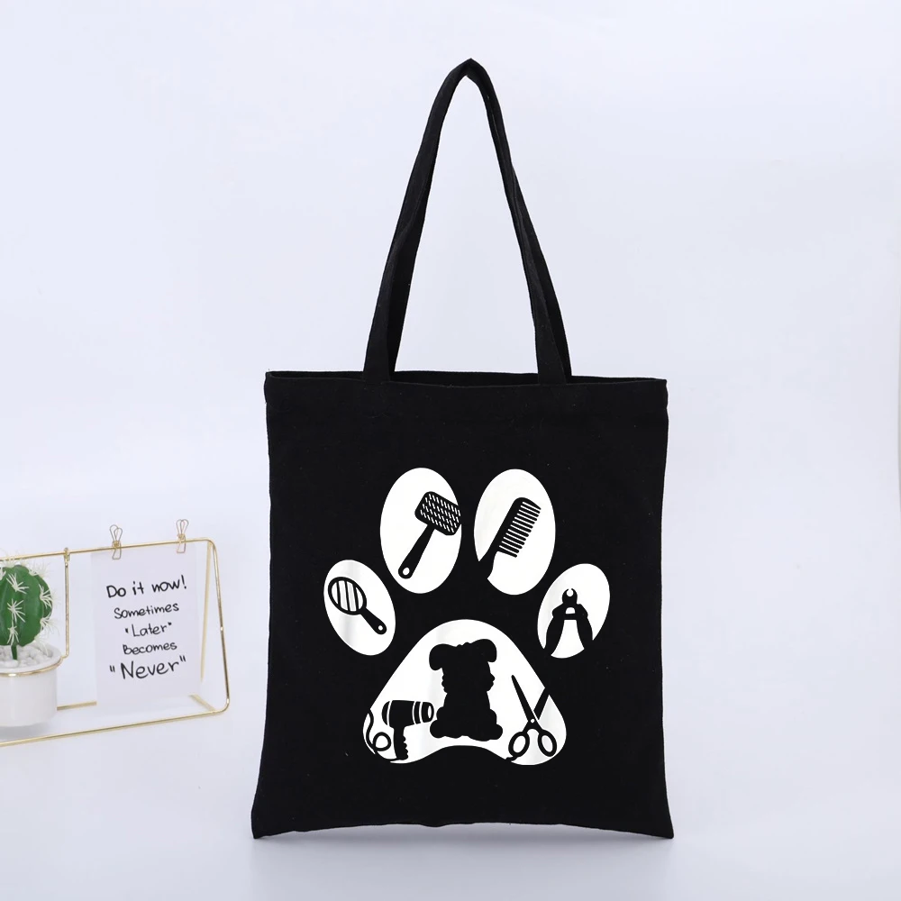 Pet Lovers' Black Canvas Tote Bag with Paw Print and Pet Grooming Tools Graphic, Casual Style for Daily Shopping