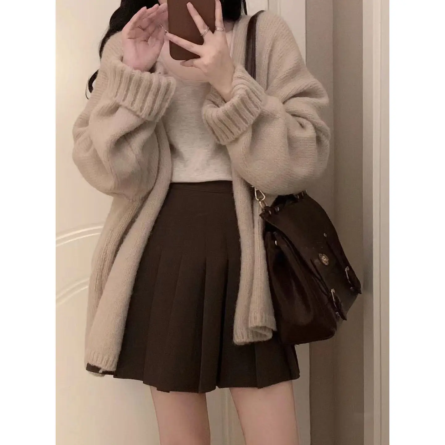 Spring Wear Female 2023 New Korean Version of The Hundred with Suspenders Loose Cardigan Thin Pleated Skirt Three-piece Set