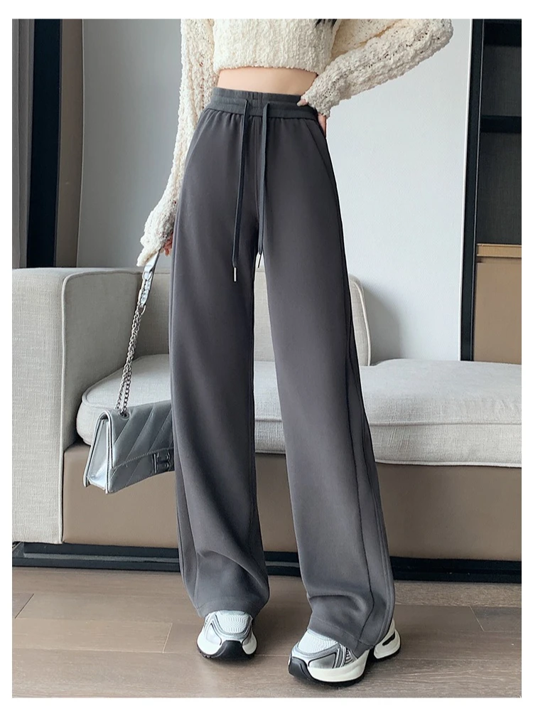 กางเกงวอร์มเอวสูงสไตล์วินเทจสำหรับผู้หญิง ฤดูใบไม้ร่วง ฤดูหนาว 2025 รุ่นใหม่ แต่งเชือกรูด ทรงขาบาน สวมใส่สบาย หลวม ยาวเต็มตัว