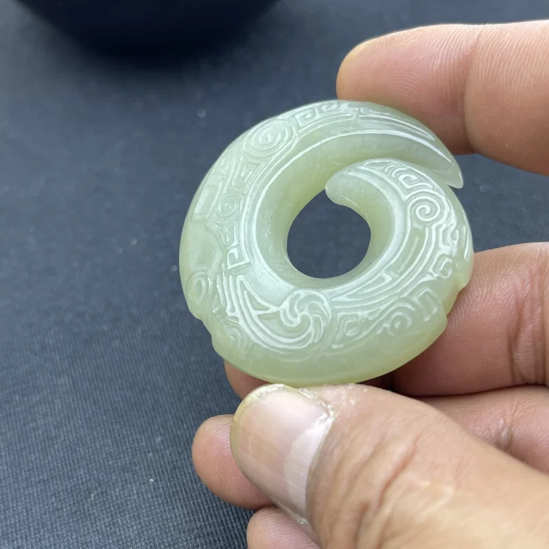 Hetian jade pendant, unisex, with a rotating, featuring a reincarnation motif, a safe design, and an embossed