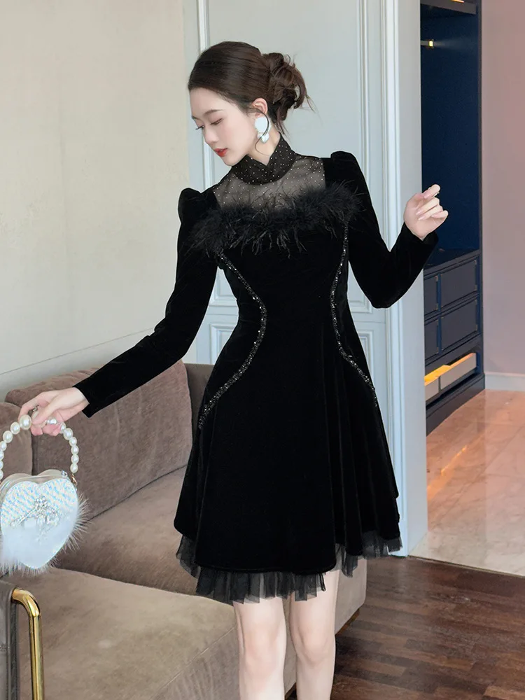 Lente nieuwe dames Franse opstaande kraag taille afslankende zwarte onregelmatige fluwelen jurk