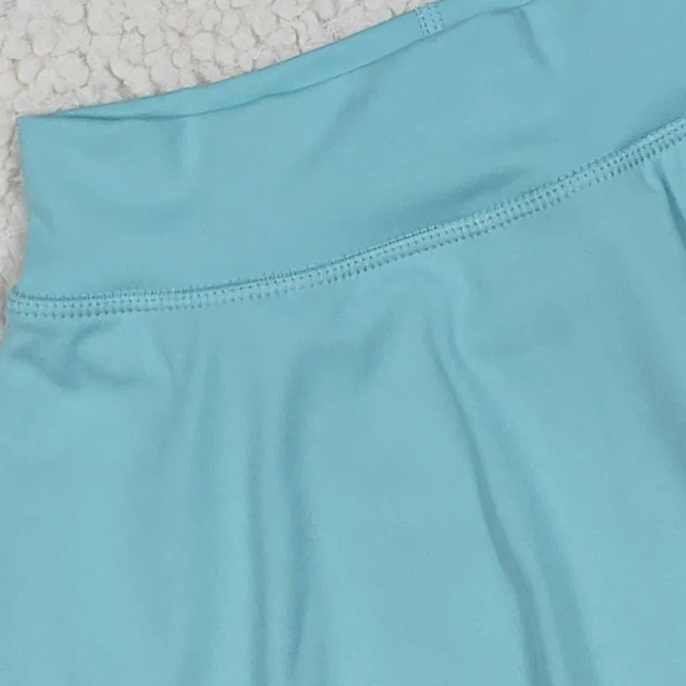 طفلة بوتيك اليوغا الملابس الخضراء النشطة طفل الأشرطة قميص تنورة السراويل ملابس أطفال Skort مجموعة الملابس الرياضية بالجملة