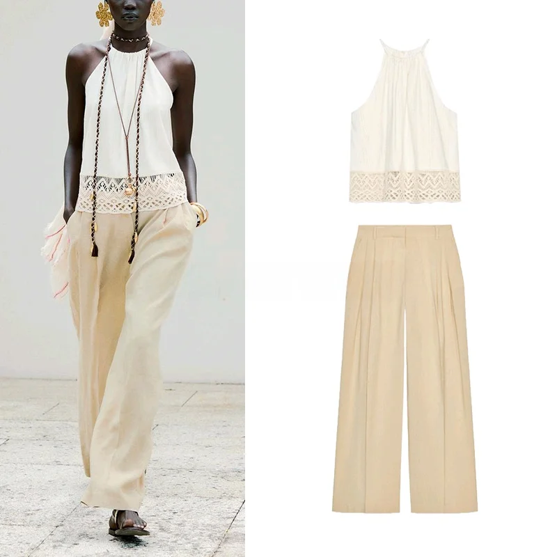 ستايل عطلة الصيف: بلوزة ذات فتحة خلفية من خليط الكتان مع بنطلون واسع الأرجل مطوي، طقم من قطعتين برقبة مستديرة وأكمام قصيرة