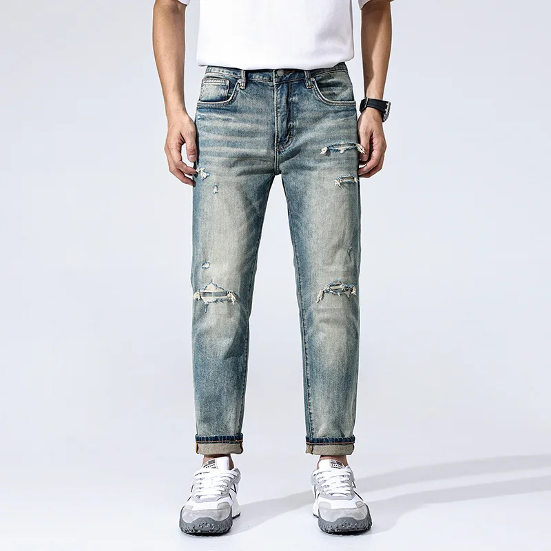 

2025 Spring and Autumn High Quality Slimming Ripped Light Blue Grinding Denim Jeans Youth Japanese Comfortable Pants